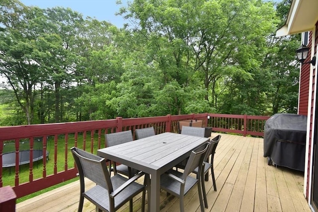 21 Hunt Dr, Stoughton, MA 02072 - wooden terrace featuring outdoor dining area and a grill