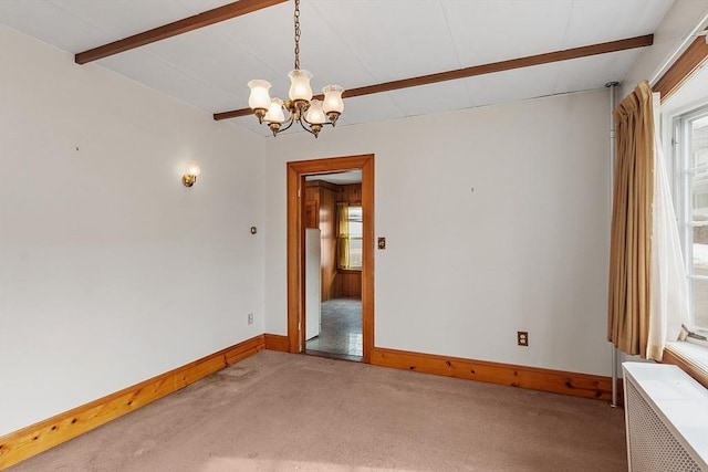 spare room featuring light colored carpet, baseboards, beam ceiling, radiator, and an inviting chandelier