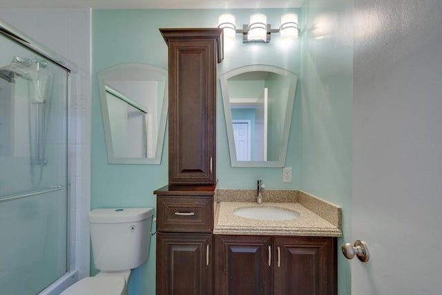3 Concord Greene Unit 4, Concord, MA 01742 - bathroom with toilet, a shower stall, and vanity