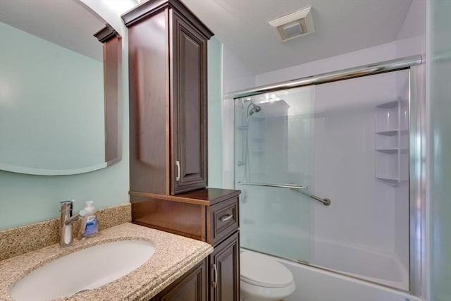 3 Concord Greene Unit 4, Concord, MA 01742 - full bathroom featuring vanity, toilet, and combined bath / shower with glass door