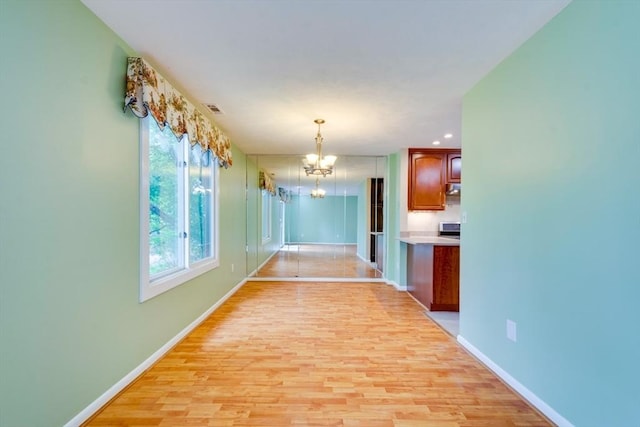 3 Concord Greene Unit 4, Concord, MA 01742 - hallway with a chandelier, light wood-style floors, baseboards, and recessed lighting