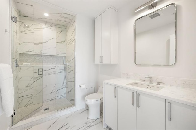 700 Harrison Ave Unit Ph-610, Boston, MA 02118 - bathroom featuring toilet, marble look tile flooring, a marble finish shower, and vanity