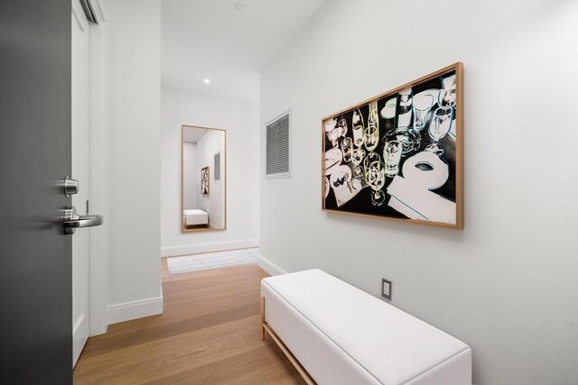 700 Harrison Ave Unit Ph-610, Boston, MA 02118 - hall with light wood-type flooring, baseboards, and recessed lighting