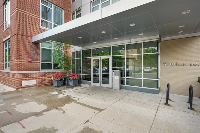 700 Harrison Ave Unit Ph-610, Boston, MA 02118 - property entrance with brick siding, a patio, and french doors
