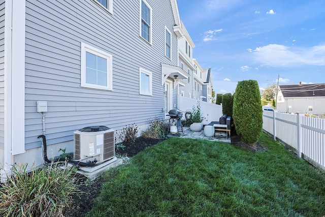 view of yard featuring central AC