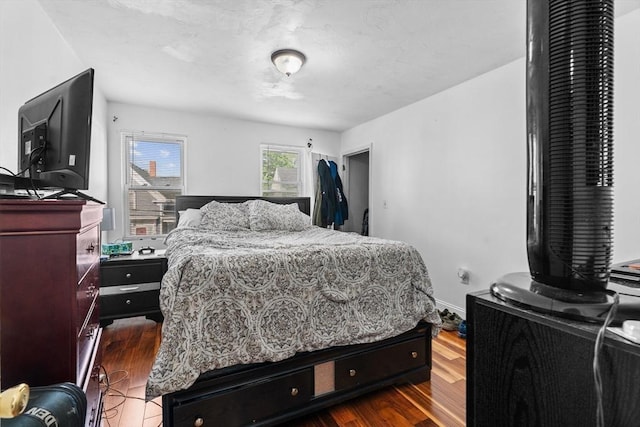 56 N Warren Ave, Brockton, MA 02301 - bedroom with dark wood-type flooring
