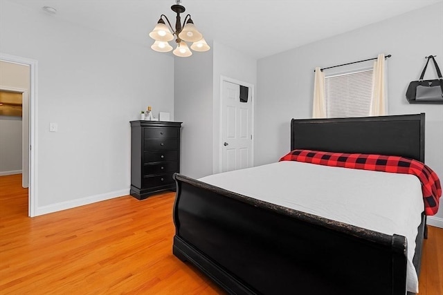 56 N Warren Ave, Brockton, MA 02301 - bedroom featuring light wood finished floors and a chandelier