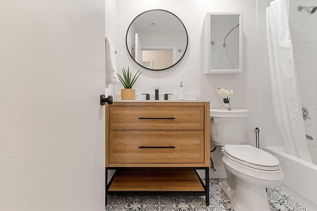 full bathroom with tile patterned flooring, shower / tub combo, toilet, and vanity