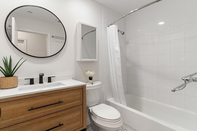 full bath with shower / tub combo, vanity, and toilet