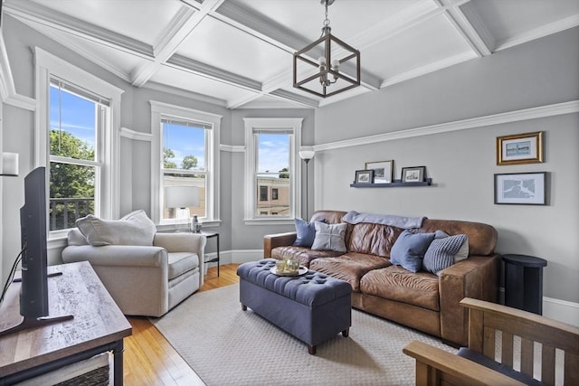 40 King St Unit 3, Boston, MA 02122 - living room featuring coffered ceiling, a chandelier, light wood finished floors, beam ceiling, and ornamental molding