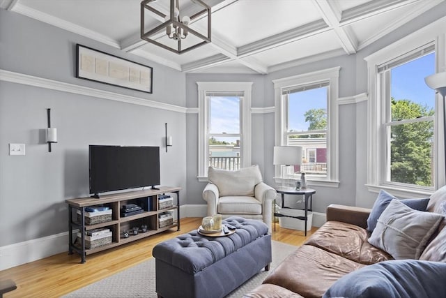 40 King St Unit 3, Boston, MA 02122 - living room featuring plenty of natural light, coffered ceiling, wood finished floors, beamed ceiling, and a chandelier