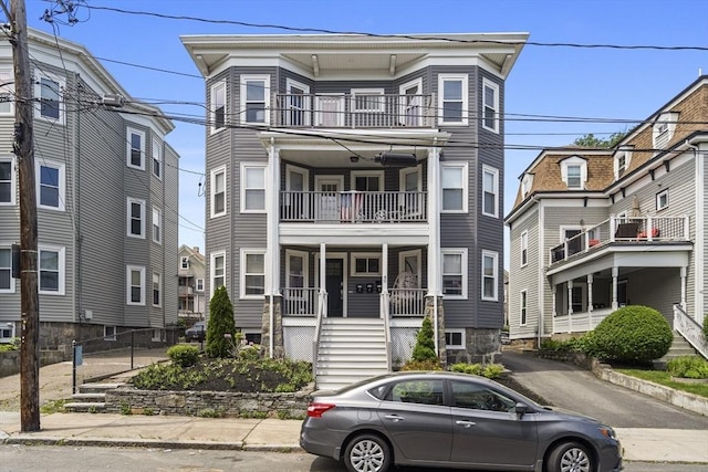 40 King St Unit 3, Boston, MA 02122 - townhome / multi-family property with a balcony, stairway, and a porch