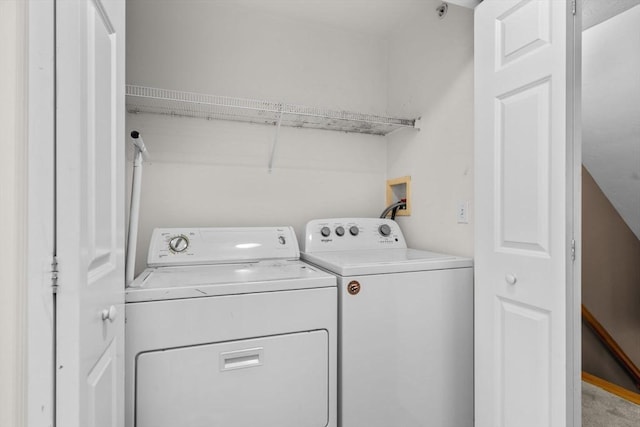 laundry area with carpet flooring and washer and clothes dryer