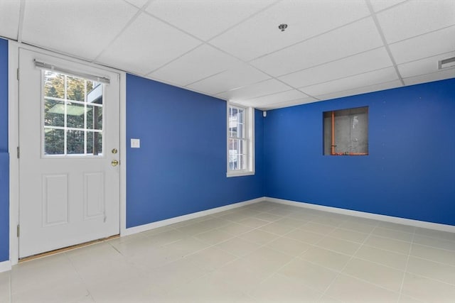 interior space featuring a paneled ceiling