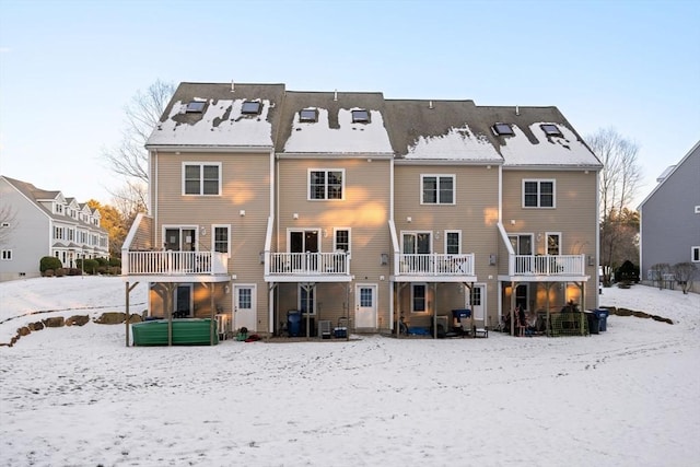 view of snow covered property