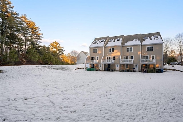 view of snow covered house