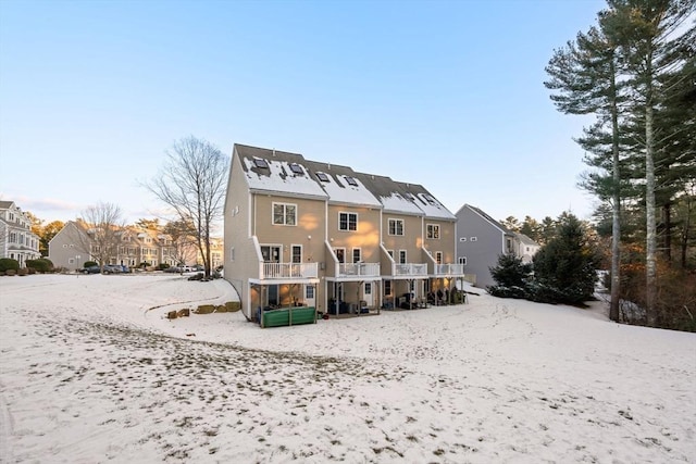 view of snow covered property