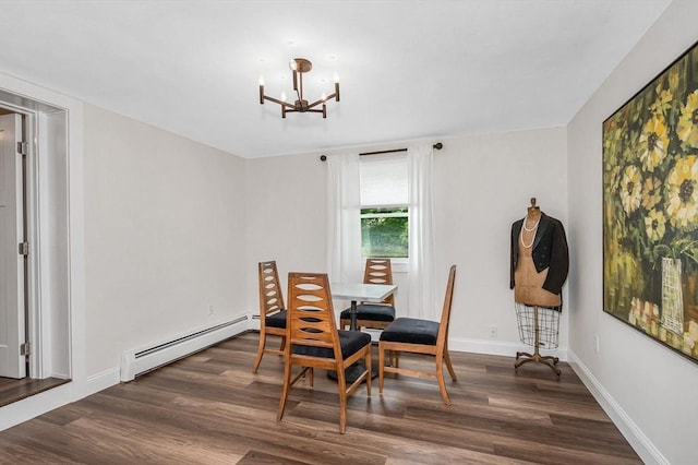 7 Washington St, Groveland, MA 01834 - dining area featuring a baseboard heating unit, wood finished floors, and a chandelier