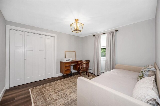 7 Washington St, Groveland, MA 01834 - bedroom featuring dark wood-style flooring, a closet, and a chandelier