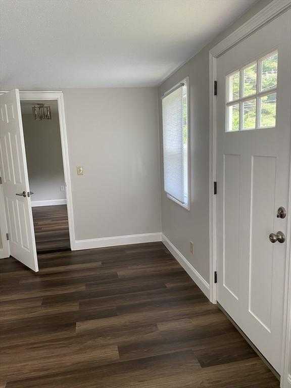 7 Washington St, Groveland, MA 01834 - foyer entrance with dark wood finished floors