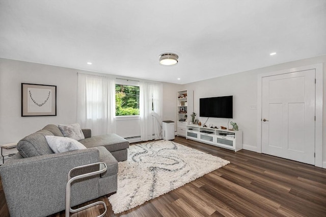 7 Washington St, Groveland, MA 01834 - living room with dark wood finished floors, recessed lighting, and a baseboard heating unit