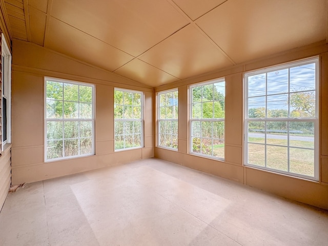 unfurnished sunroom with vaulted ceiling