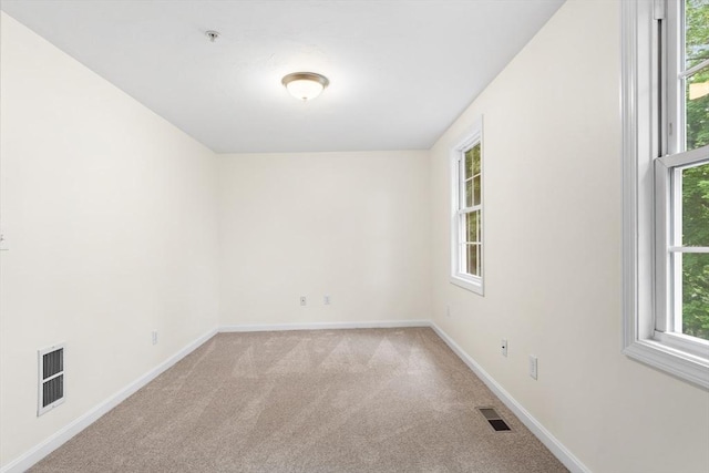 14 Watson St Unit 14, Lowell, MA 01852 - empty room with light carpet and a pendent fire sprinkler