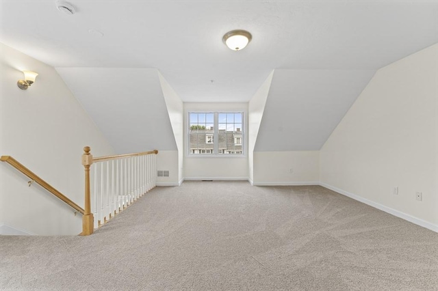 14 Watson St Unit 14, Lowell, MA 01852 - additional living space featuring carpet and vaulted ceiling
