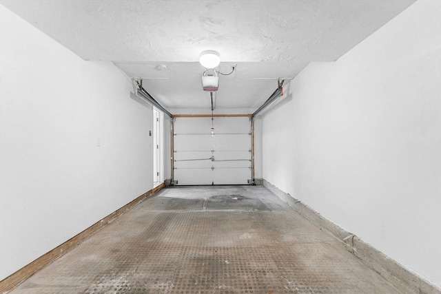 14 Watson St Unit 14, Lowell, MA 01852 - garage featuring a garage door opener