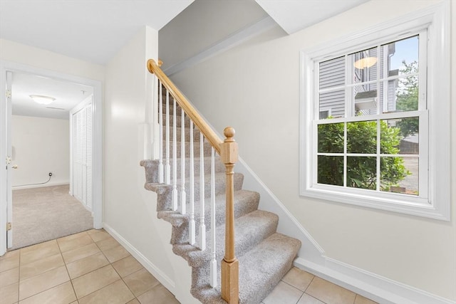 14 Watson St Unit 14, Lowell, MA 01852 - staircase featuring tile patterned flooring and carpet flooring