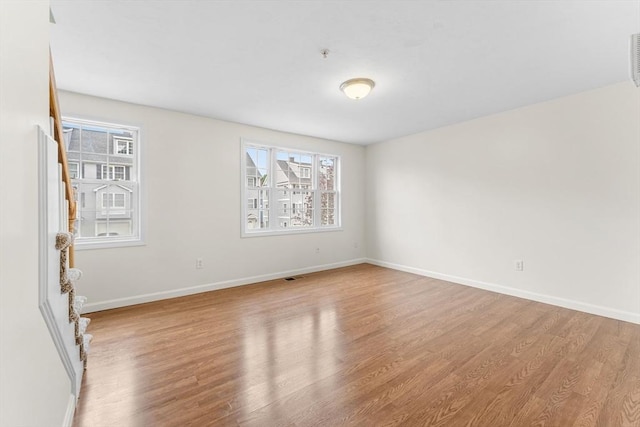 14 Watson St Unit 14, Lowell, MA 01852 - unfurnished room featuring light wood-style floors and fire sprinkler in ceiling