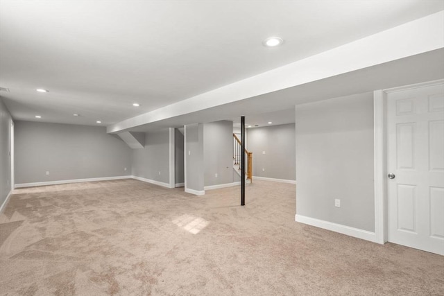 basement with light carpet