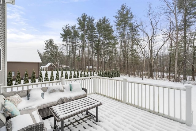 view of snow covered deck