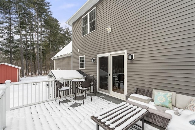 view of snow covered deck