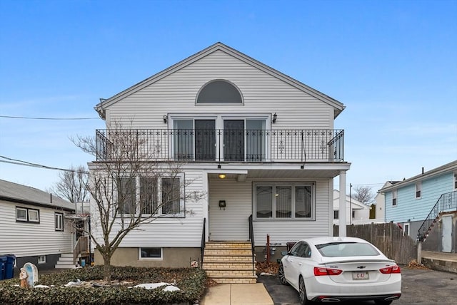 view of front of home with a balcony