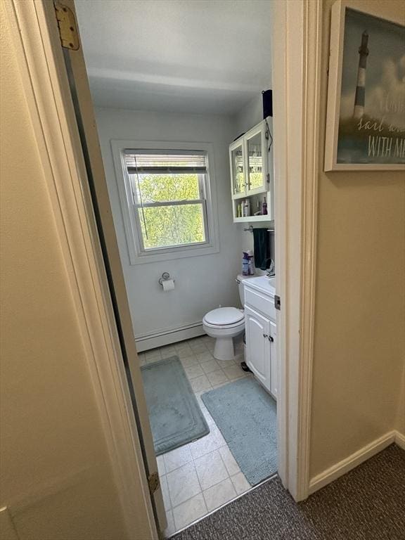 115 Redemption Rock Trl, Sterling, MA 01564 - bathroom with a baseboard heating unit, toilet, and vanity