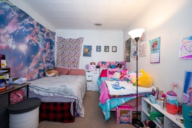 bedroom with carpet and crown molding