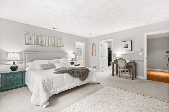 12 Scotland Dr, Andover, MA 01810 - bedroom with light carpet, a spacious closet, baseboards, and a closet