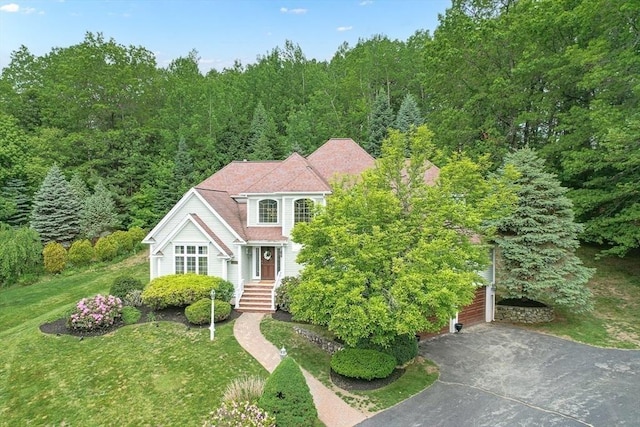 12 Scotland Dr, Andover, MA 01810 - view of front of property with a view of trees and a front lawn