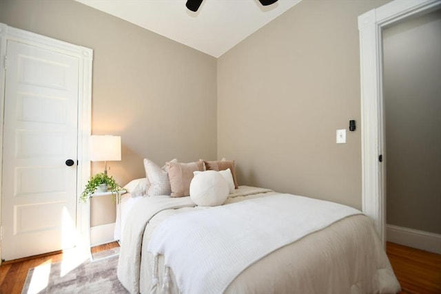 18 Lyon St Unit 2, Boston, MA 02122 - bedroom with vaulted ceiling, wood finished floors, baseboards, and ceiling fan