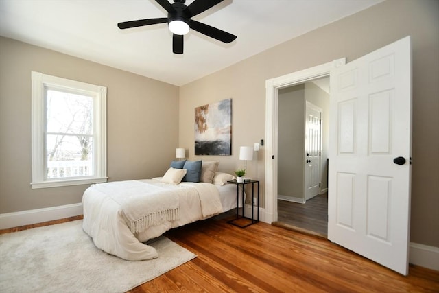 18 Lyon St Unit 2, Boston, MA 02122 - bedroom with baseboards, wood finished floors, and a ceiling fan