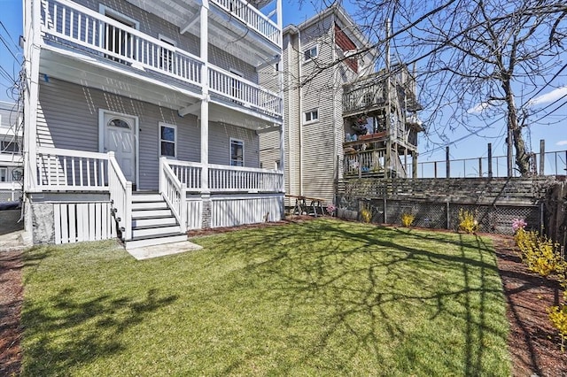 18 Lyon St Unit 2, Boston, MA 02122 - view of yard with a porch and a balcony