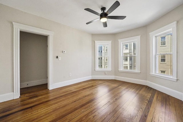 18 Lyon St Unit 2, Boston, MA 02122 - unfurnished room featuring dark wood-type flooring, ceiling fan, and baseboards