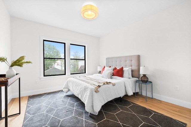 42 Bower St Unit 2, Medford, MA 02155 - bedroom with wood finished floors and baseboards