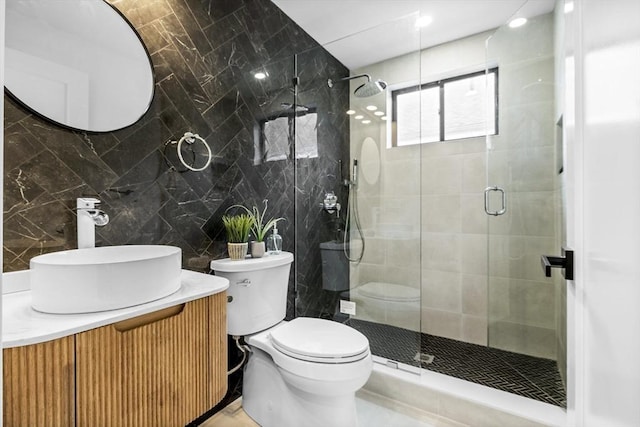 42 Bower St Unit 2, Medford, MA 02155 - full bath with tile walls, toilet, a shower stall, and vanity