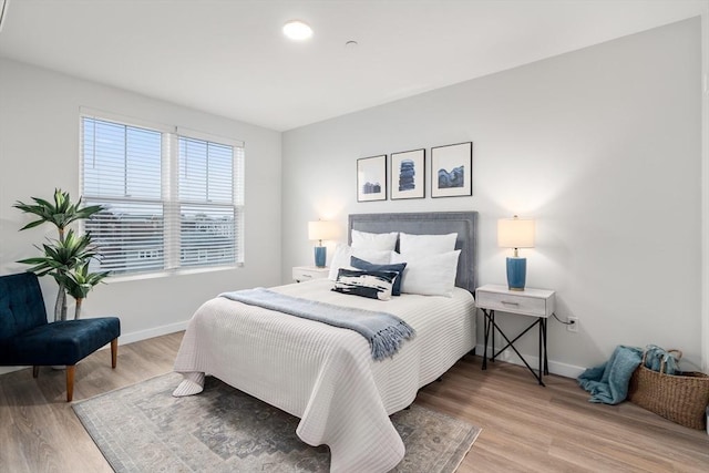 10 Somerset Unit 403, Winthrop, MA 02152 - bedroom featuring baseboards and wood finished floors