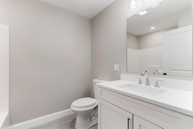 4 Bronson St, Fall River, MA 02721 - bathroom featuring vanity, wood finished floors, and a shower