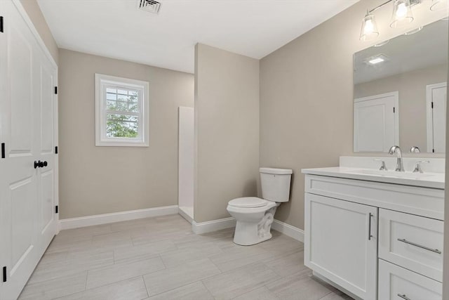 4 Bronson St, Fall River, MA 02721 - bathroom featuring vanity and baseboards