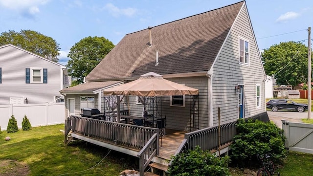 217 Hathaway Commons Rd, Fall River, MA 02720 - rear view of house featuring a wooden deck and roof with shingles