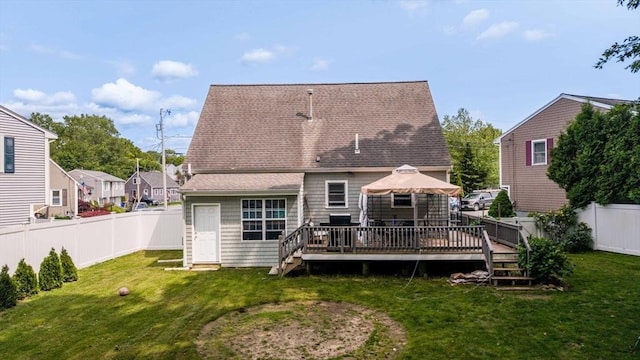 217 Hathaway Commons Rd, Fall River, MA 02720 - rear view of property with roof with shingles, a deck, a gazebo, and a fenced backyard